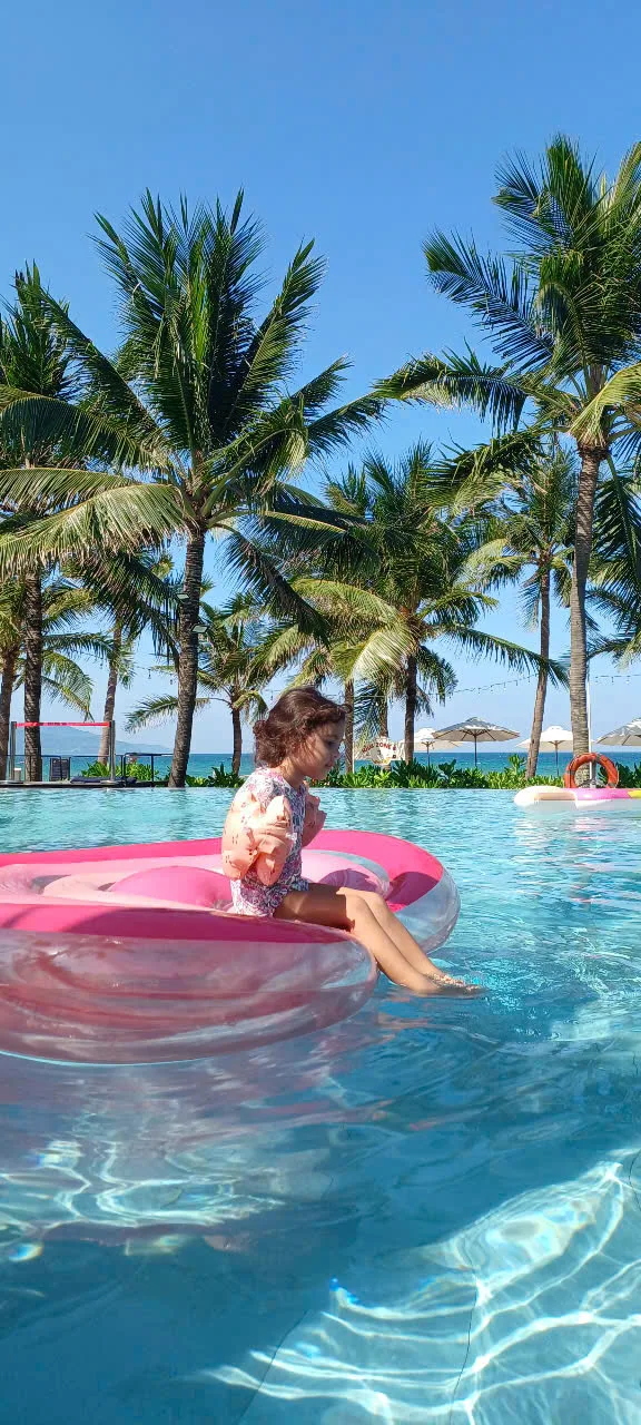 Babysitter providing gentle care at a Da Nang hotel while parents work