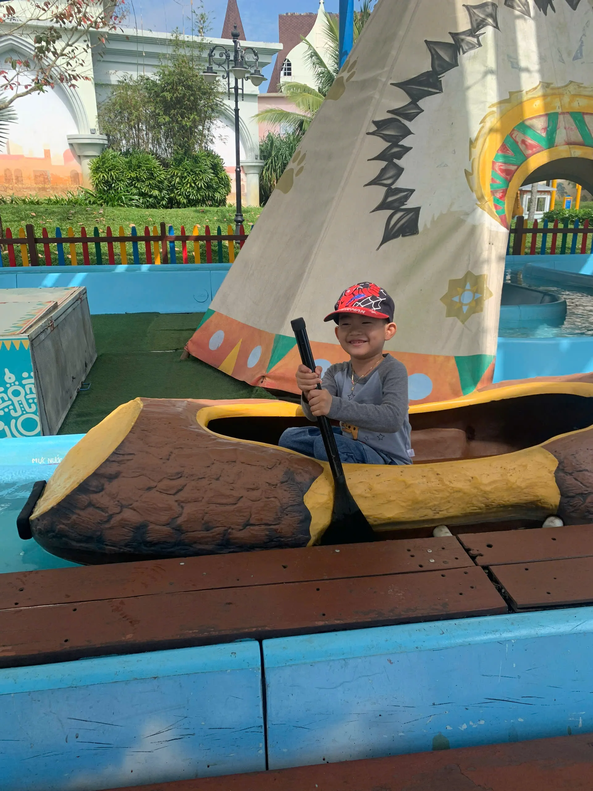 Nanny supporting calm play during a long stay in Hoi An