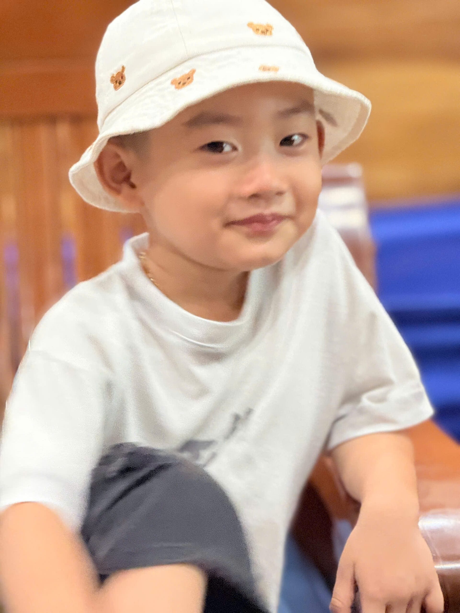 nanny caring child in beach resort