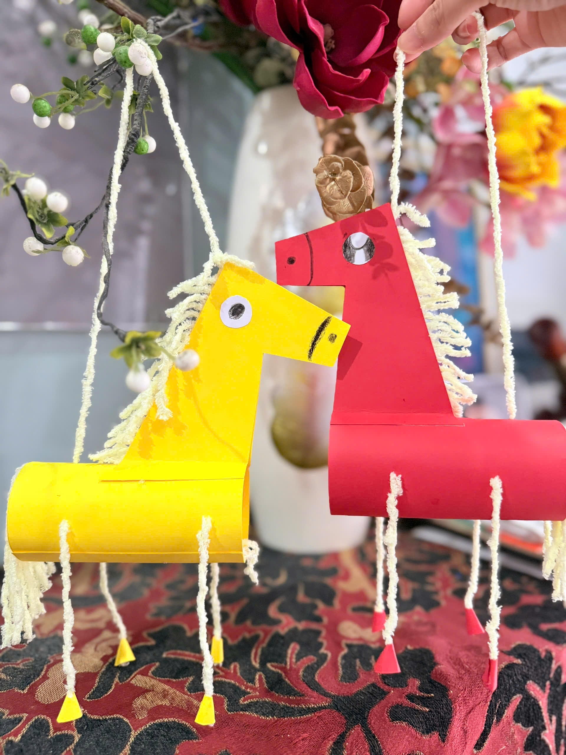 Trusted babysitter with kids activities in villa setting - gentle supervision