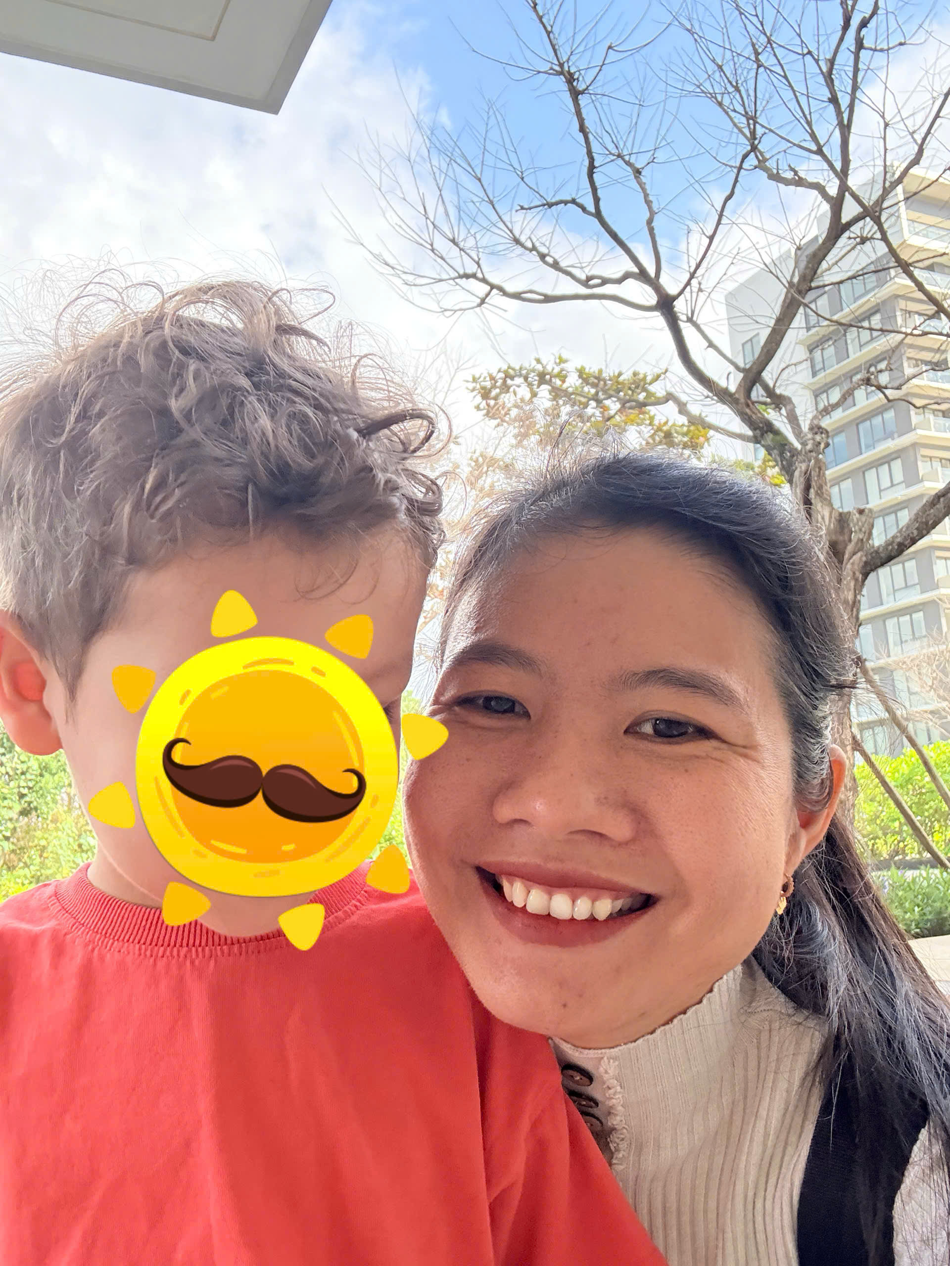 Trusted babysitter playing with child in Da Nang in safe and engaging environment