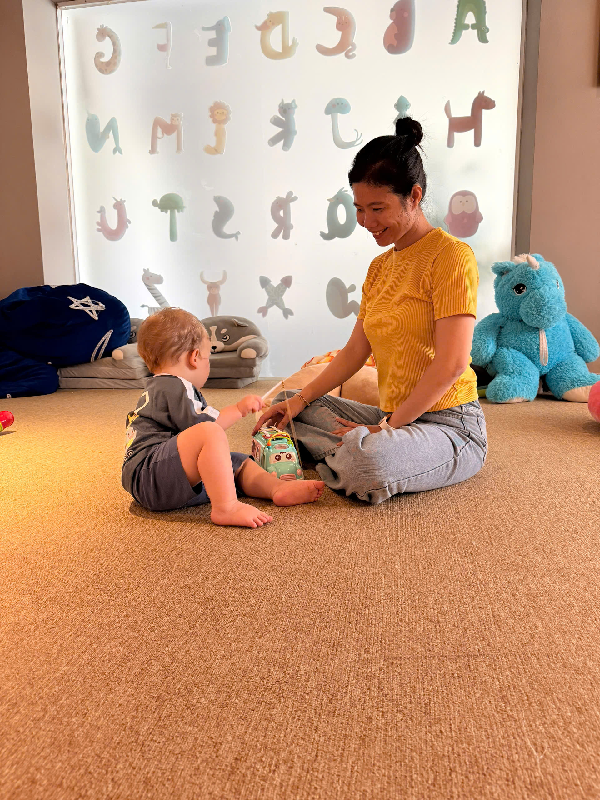 Nanny for vacation families at Almanity Hoi An Wellness Resort providing warm personal childcare