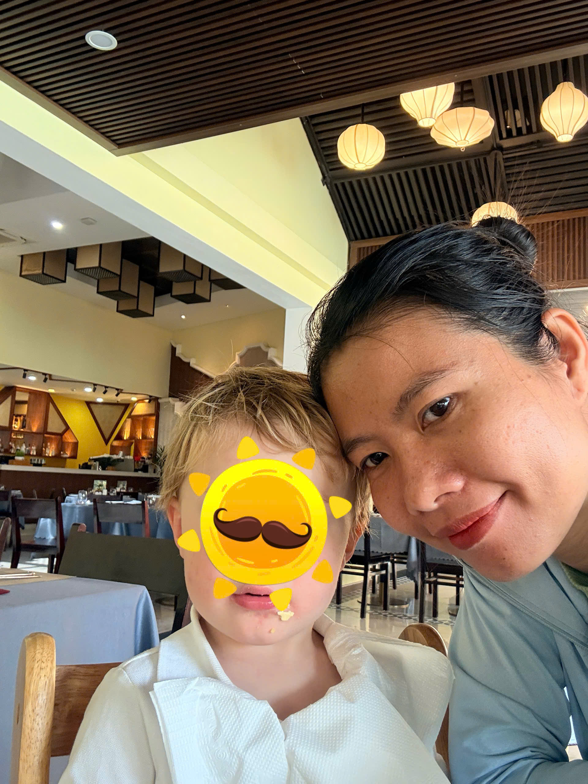 parents finally relaxing while trusted nanny cares for child at resort