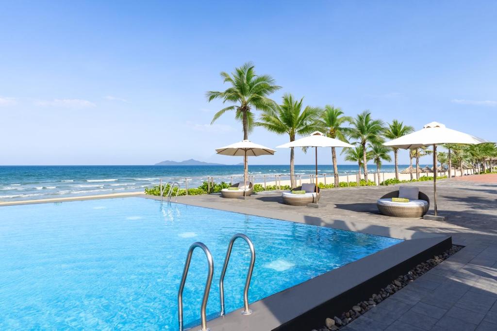 Professional babysitter helping parents enjoy a calmer stay at Meliá Danang Beach Resort