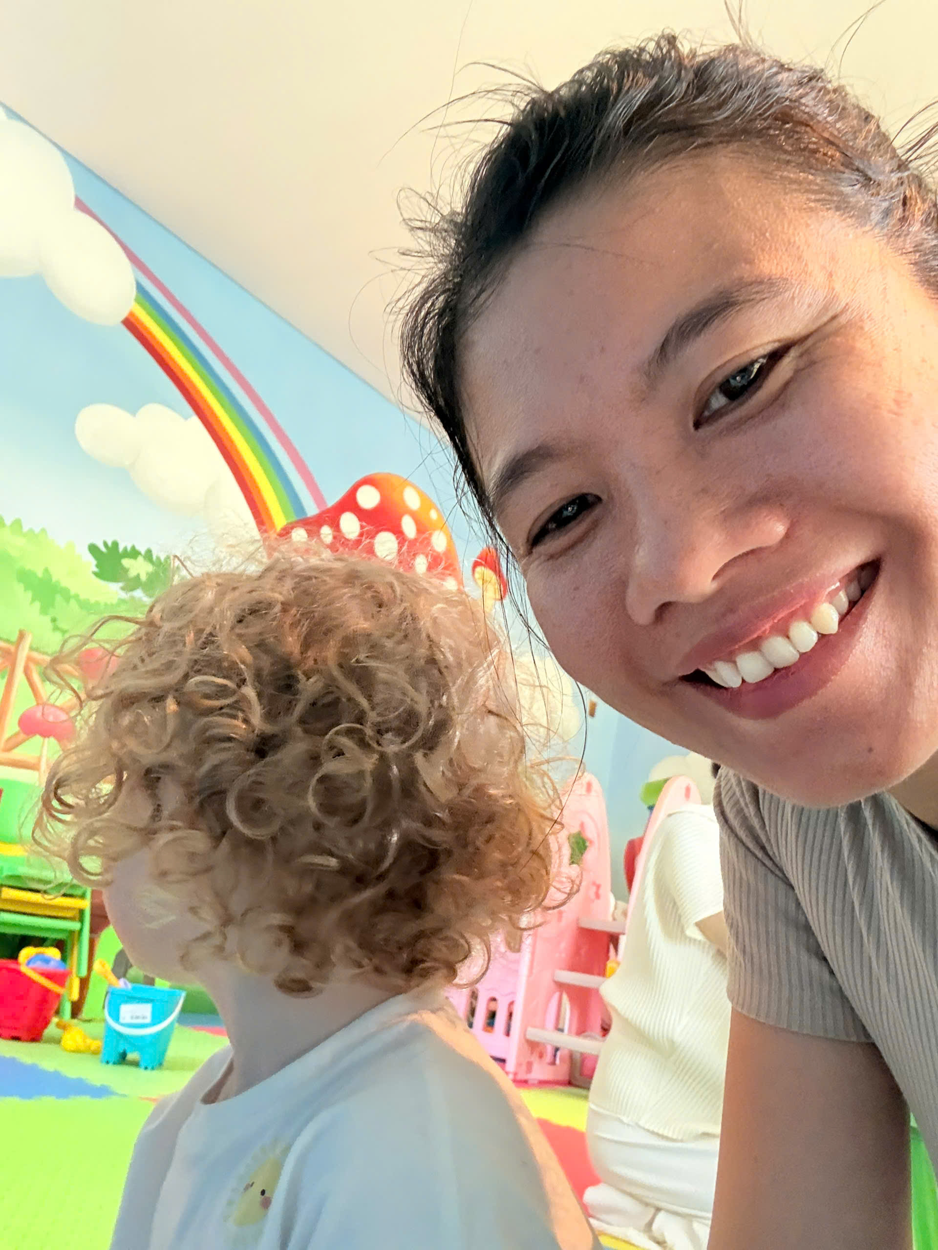 Trusted nanny caring gently for a baby inside a private villa setting at Meliá Danang Beach Resort