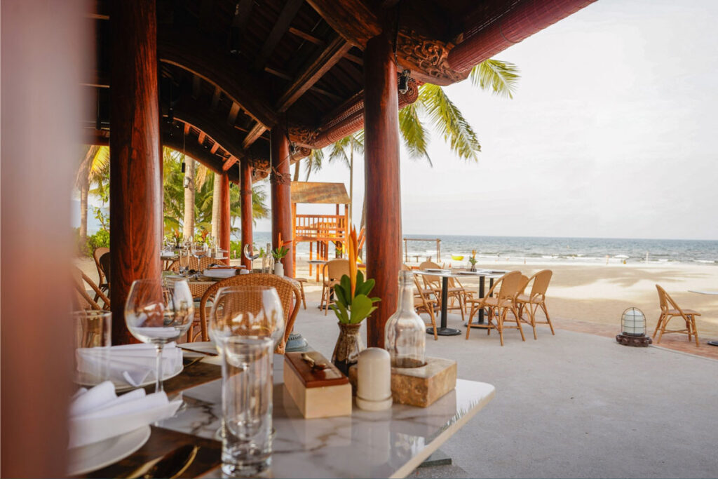 babysitter at Furama Villas Danang caring for a child inside a private luxury villa