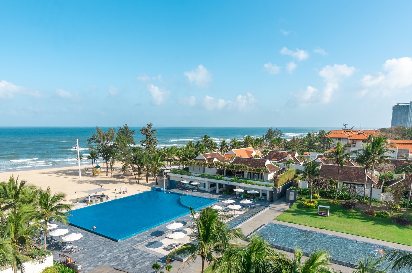experienced babysitter at Pullman Danang helping a child feel safe during a family stay