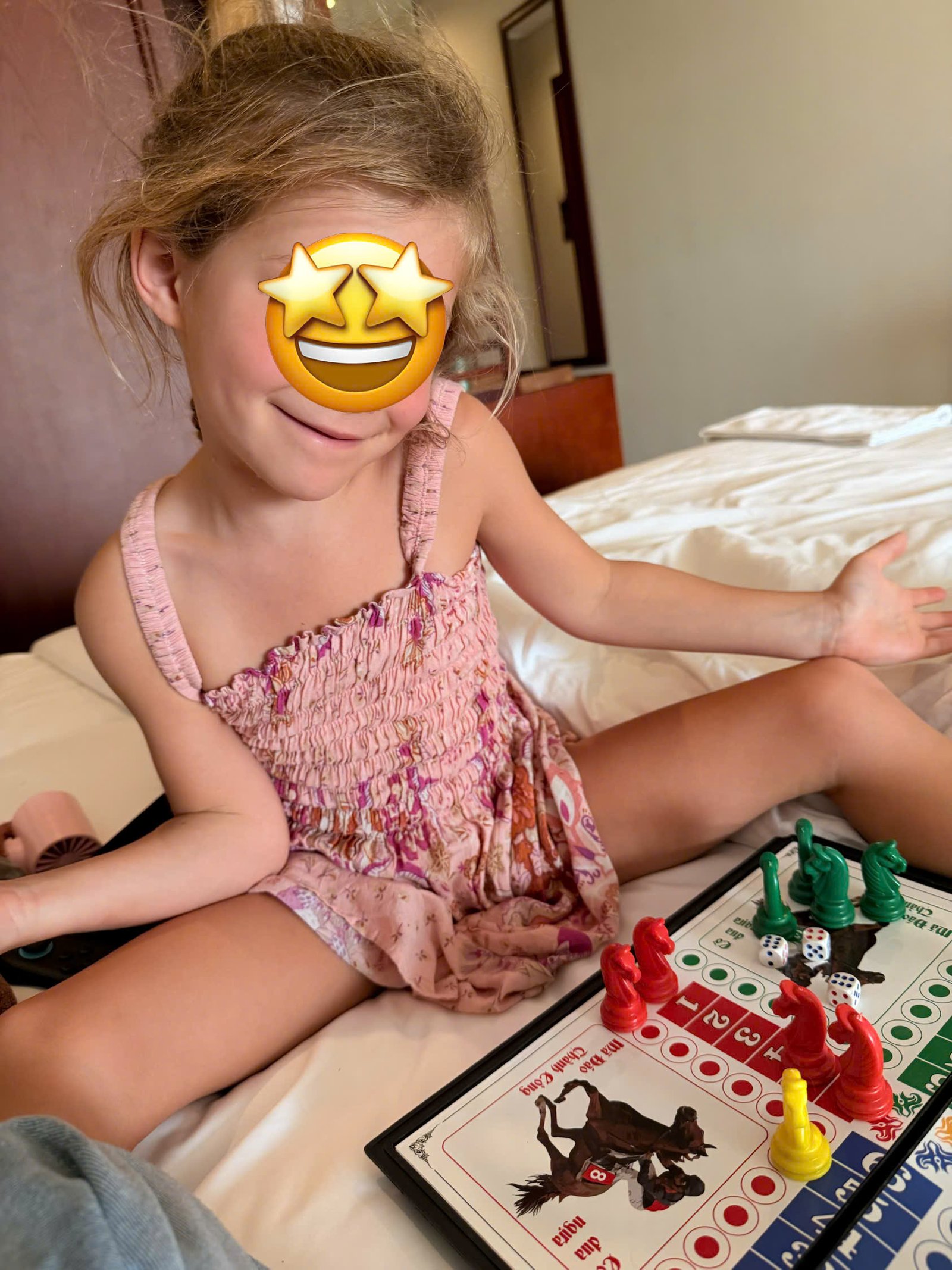 Annie providing attentive one-to-one childcare for a young resort guest in Hoi An